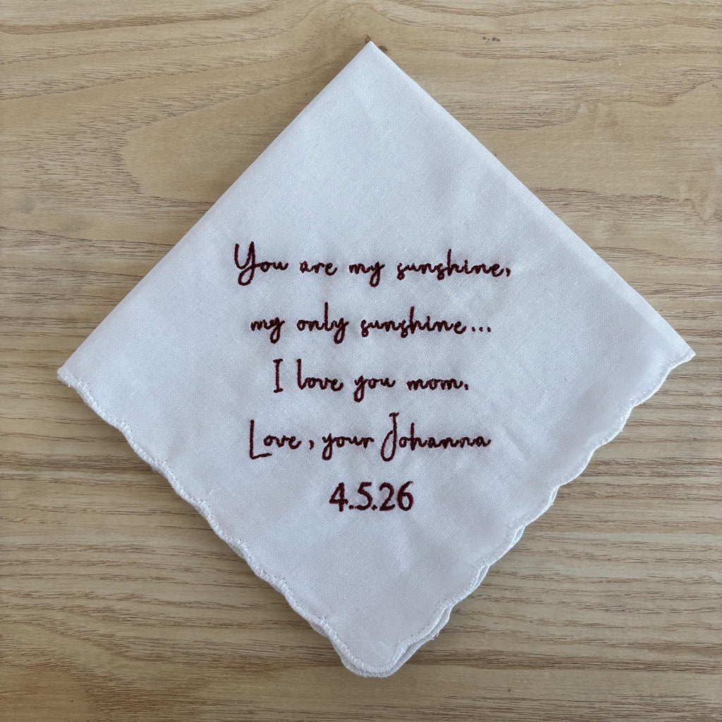 Embroidered handkerchief with a scalloped edge