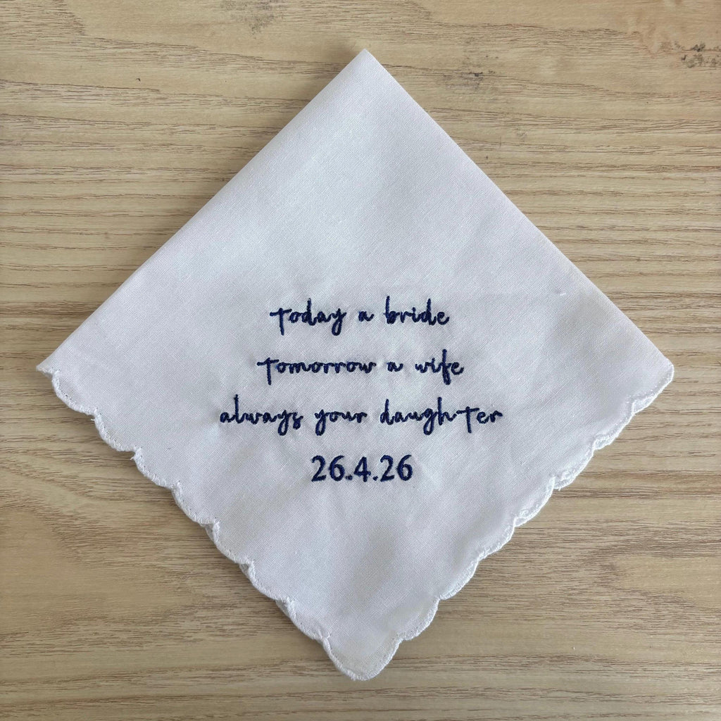 Embroidered handkerchief with a scalloped edge