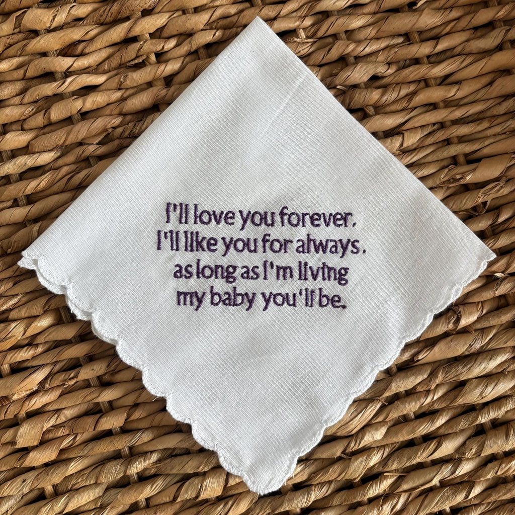 Embroidered handkerchief with a scalloped edge
