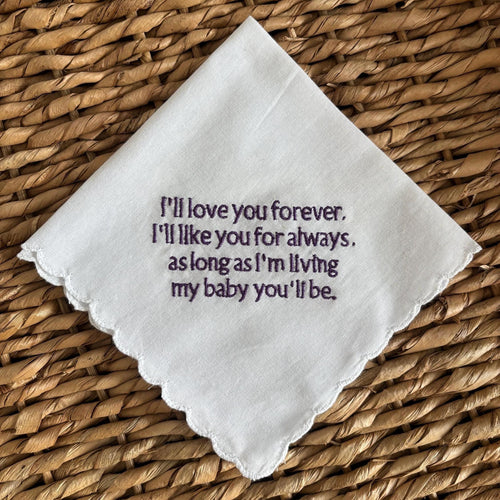 Embroidered handkerchief with a scalloped edge